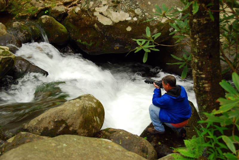De fotograaf van het avontuur stock afbeelding De fotograaf van het avontuur stock afbeelding