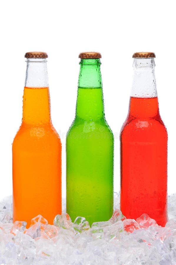 Closeup of three different soda bottles covered in condensation standing in a bed of ice. Vertical format over white. Closeup of three different soda bottles covered in condensation standing in a bed of ice. Vertical format over white.