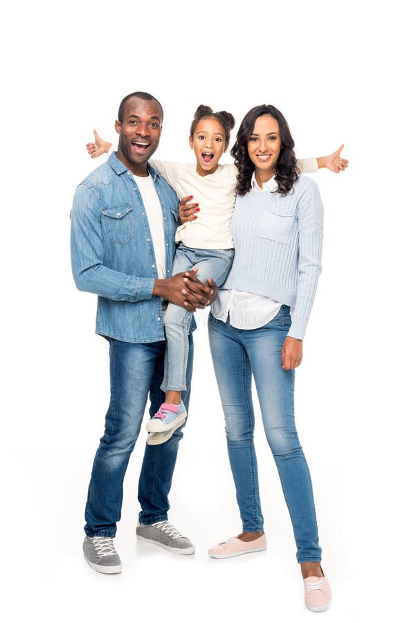happy parents carrying cute african american girl showing thumbs up isolated on white. happy parents carrying cute african american girl showing thumbs up isolated on white