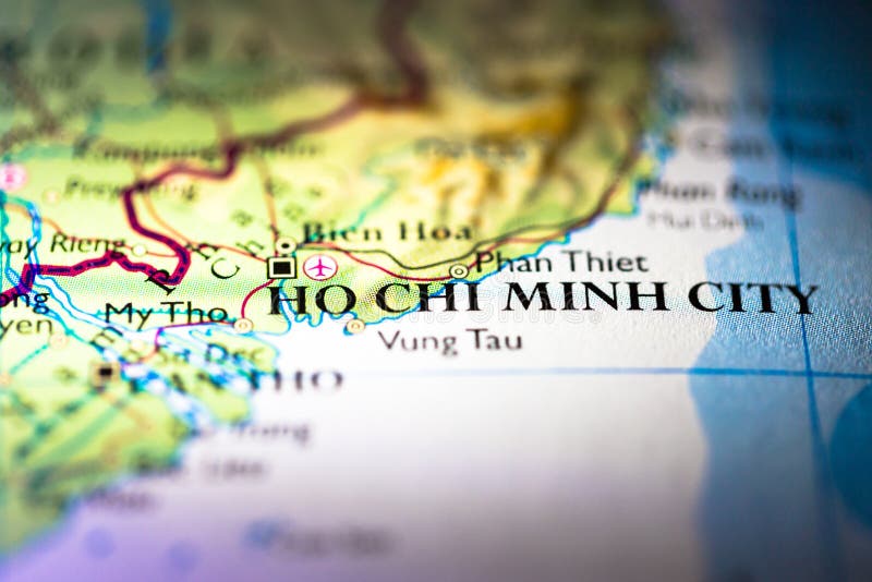 Shallow depth of field focus on geographical map location of Ho Chi Minh city in Vietnam Indochina Asia continent on atlas. Shallow depth of field focus on geographical map location of Ho Chi Minh city in Vietnam Indochina Asia continent on atlas.