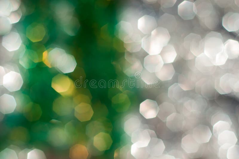 De groene en witte bokehlichten defocused, vatten achtergrond samen stock afbeelding De groene en witte bokehlichten defocused, vatten achtergrond samen stock afbeelding