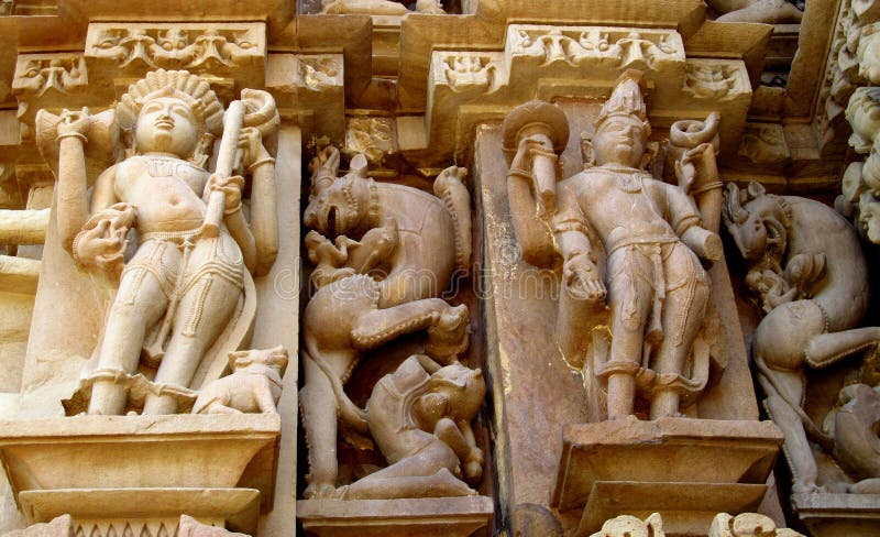 De Groep van de Khajurahotempel Monumenten in IndiaSandstone-beeldhouwwerken in Khajuraho-Tempelgroep Monumenten in India royalty-vrije stock foto's De Groep van de Khajurahotempel Monumenten in IndiaSandstone-beeldhouwwerken in Khajuraho-Tempelgroep Monumenten in India royalty-vrije stock foto's