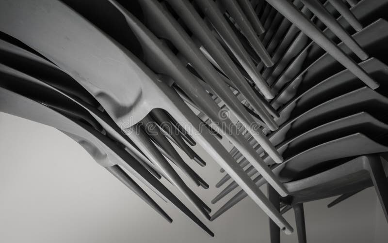 De grote verbazende abstracte close-upmening van een plastiek zit op donkere achtergrond voor stock foto De grote verbazende abstracte close-upmening van een plastiek zit op donkere achtergrond voor stock foto