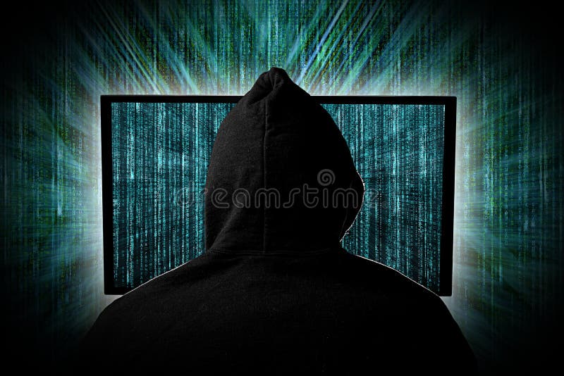 Hacker  behind glowing computer monitor display in front of green source binary code background internet cyber hack attack computer concept. Hacker  behind glowing computer monitor display in front of green source binary code background internet cyber hack attack computer concept