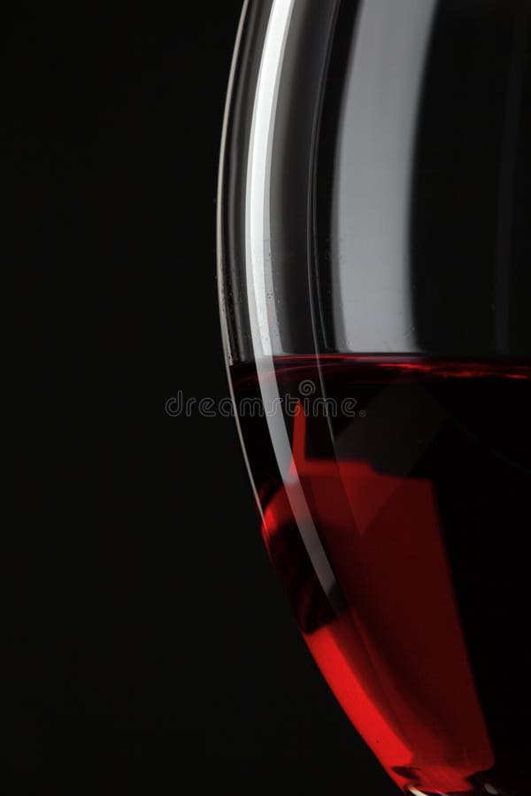 Half of red wine glass isolated on black background. Half of red wine glass isolated on black background