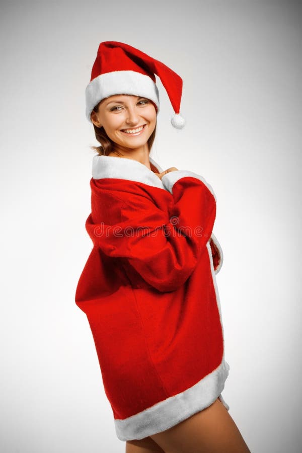 De helper van de grappige Kerstman stock foto De helper van de grappige Kerstman stock foto