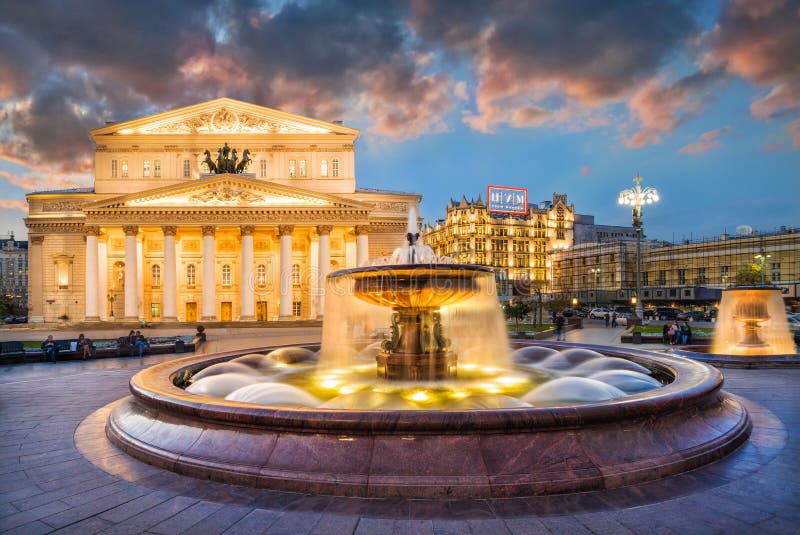 Bolshoi Theater in Moscow in the evening light of lanterns and fountains in the square near the theater. Bolshoi Theater in Moscow in the evening light of lanterns and fountains in the square near the theater