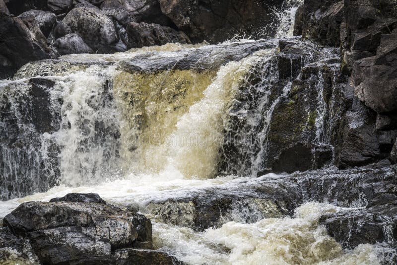 De hogere sectie van Kirkaig-Waterval dichtbij Inverkirkaig in de Hooglanden van Schotland royalty-vrije stock afbeelding De hogere sectie van Kirkaig-Waterval dichtbij Inverkirkaig in de Hooglanden van Schotland royalty-vrije stock afbeelding