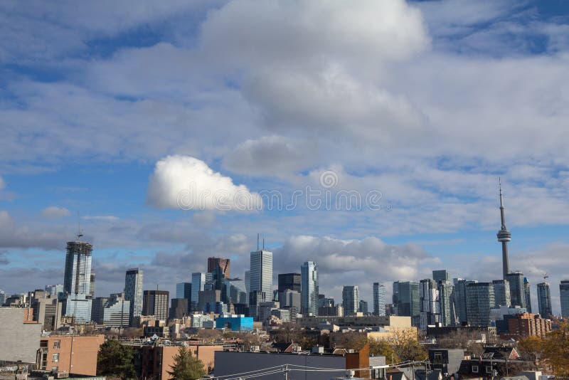Toronto is the main city of Ontario and Canada, and an American finance hub..Picture of the skyline of Toronto, with the main buildings of the downtown and some iconic skyscrapers taken from afar during an autumn afternoon. .Toronto is the capital city of the province of Ontario. Toronto is the main city of Ontario and Canada, and an American finance hub..Picture of the skyline of Toronto, with the main buildings of the downtown and some iconic skyscrapers taken from afar during an autumn afternoon. .Toronto is the capital city of the province of Ontario