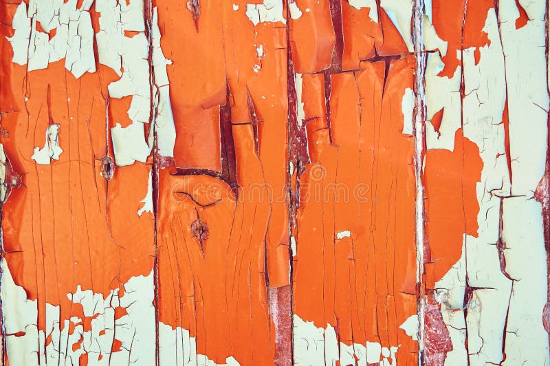 De houten achtergrond is geschilderde wit, oranje en bruin met barsten en krassen abstracte achtergrond stock afbeeldingen De houten achtergrond is geschilderde wit, oranje en bruin met barsten en krassen abstracte achtergrond stock afbeeldingen