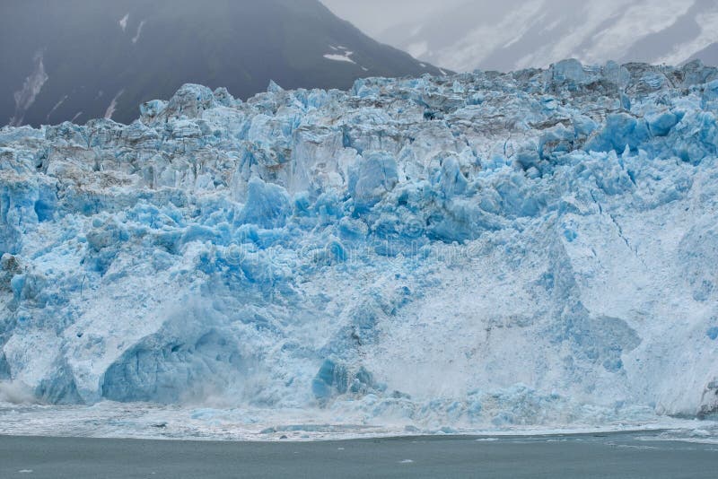De Hubbard-Gletsjer terwijl het smelten, Alaska stock afbeelding De Hubbard-Gletsjer terwijl het smelten, Alaska stock afbeelding