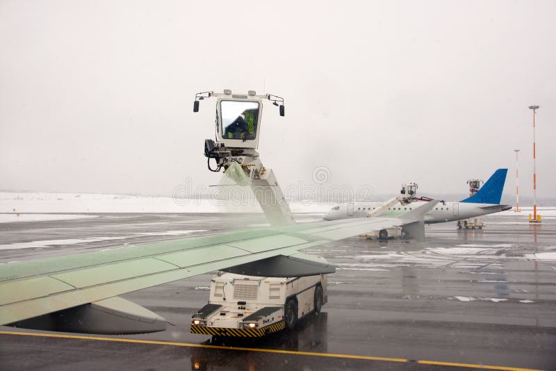 Airplane Deicing Operations V1 Stock Photo Image of frost, commercial