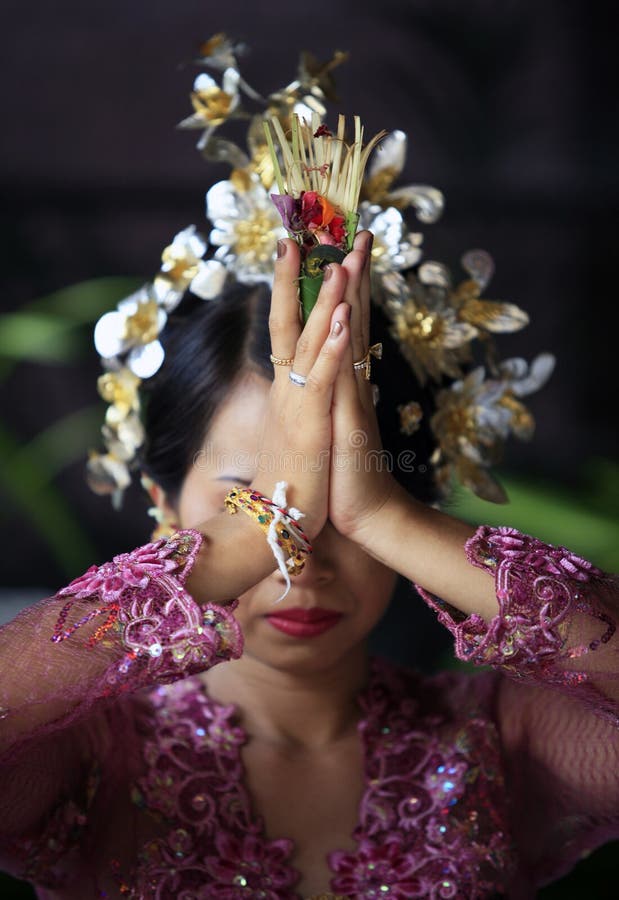 The Indonesian bride prays. Bali. Indonesia. The Indonesian bride prays. Bali. Indonesia