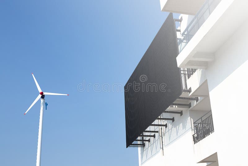 De industrie van de turbinewind Alternatieve Energie turbinemilieu de industriegeneratie De turbines van de wind op groen gebied stock fotografie De industrie van de turbinewind Alternatieve Energie turbinemilieu de industriegeneratie De turbines van de wind op groen gebied stock fotografie