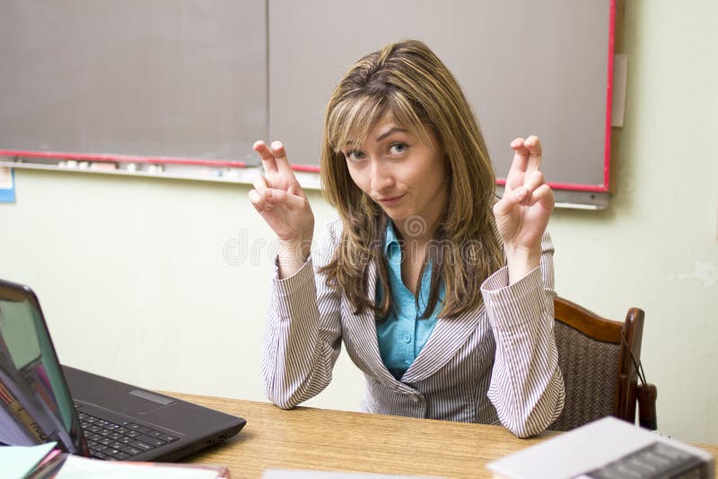 Young girl signs quotation marks by fingers. Young girl signs quotation marks by fingers