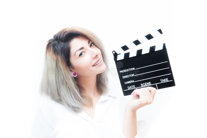 De jonge blauwe vrouw van het ogenblonde met filmklep royalty-vrije stock afbeeldingen De jonge blauwe vrouw van het ogenblonde met filmklep royalty-vrije stock afbeeldingen