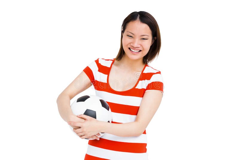 De jonge Voetbal van de Holding van de Vrouw royalty-vrije stock fotografie De jonge Voetbal van de Holding van de Vrouw royalty-vrije stock fotografie