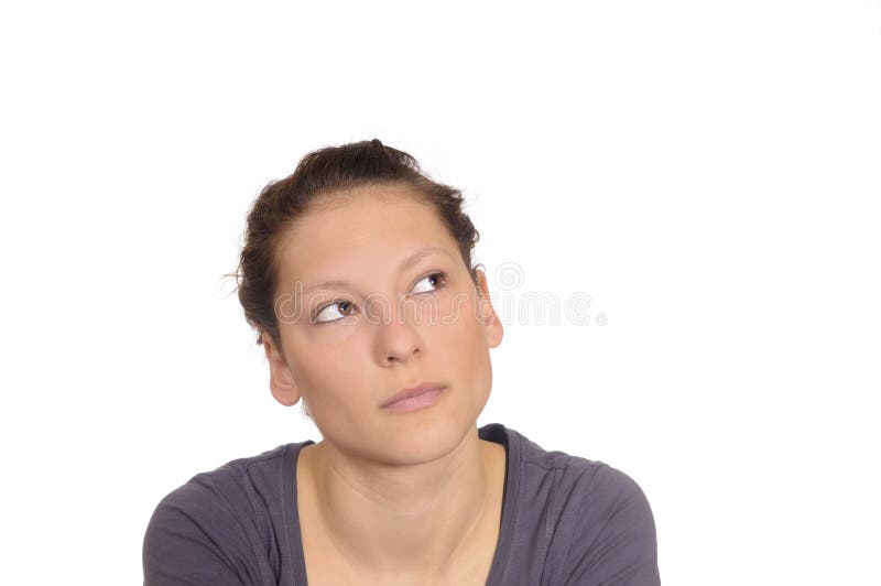 Jonge vrouw kijkt peinzend royalty-vrije stock afbeeldingen