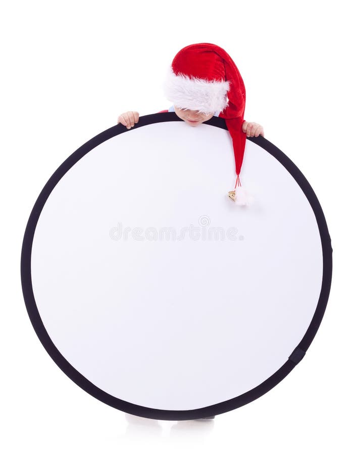 De jongen van de kerstman met groot teken stock foto's De jongen van de kerstman met groot teken stock foto's