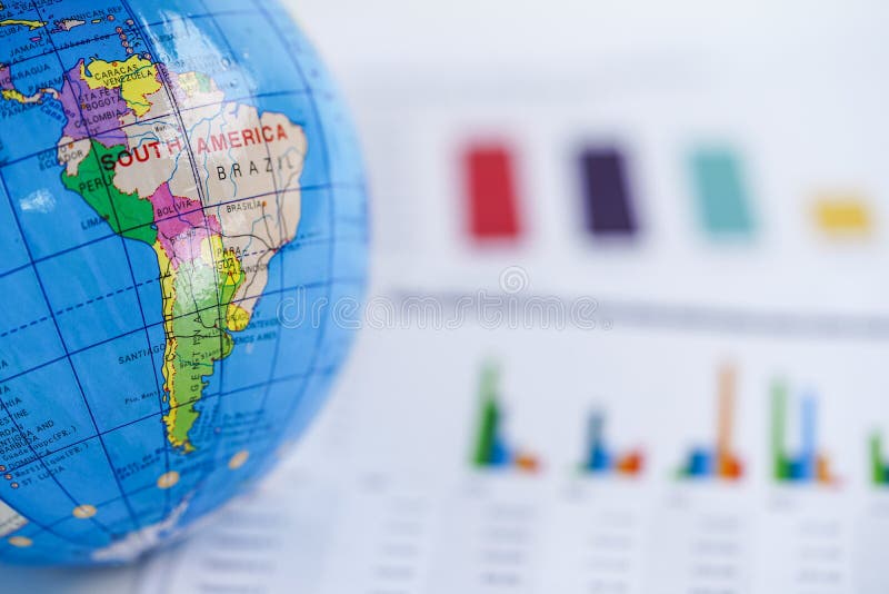 South America Globe world map on chart graph paper. Finance, Account, Statistics, Investment, Analytic research data economy and Business company meeting concept. South America Globe world map on chart graph paper. Finance, Account, Statistics, Investment, Analytic research data economy and Business company meeting concept.