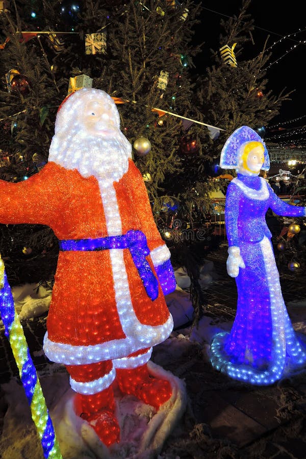 De Kerstman en het Meisje van de Sneeuw royalty-vrije stock fotografie De Kerstman en het Meisje van de Sneeuw royalty-vrije stock fotografie