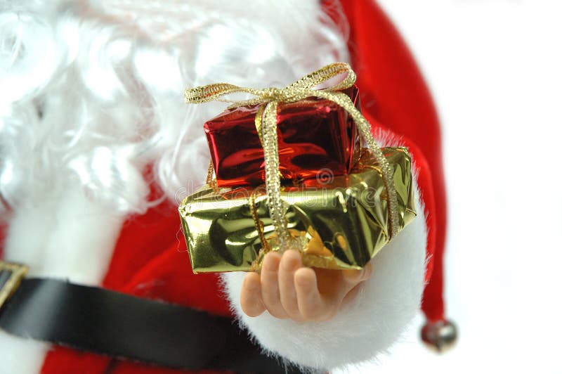 De kerstman en stelt voor royalty-vrije stock foto's De kerstman en stelt voor royalty-vrije stock foto's