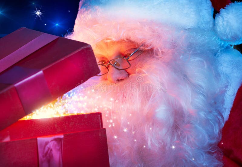 De Kerstman met de Gift van Kerstmis royalty-vrije stock fotografie De Kerstman met de Gift van Kerstmis royalty-vrije stock fotografie
