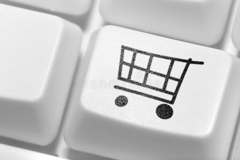 De knoop voor aankopen op het toetsenbord. Online winkel. stock fotografie De knoop voor aankopen op het toetsenbord. Online winkel. stock fotografie