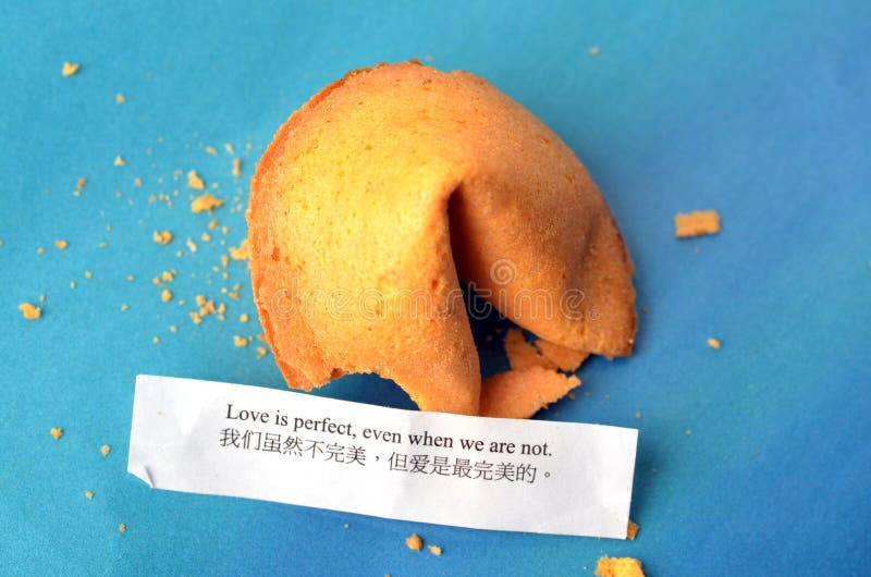Picture of chinese fortune cookies with message on blue background. Picture of chinese fortune cookies with message on blue background