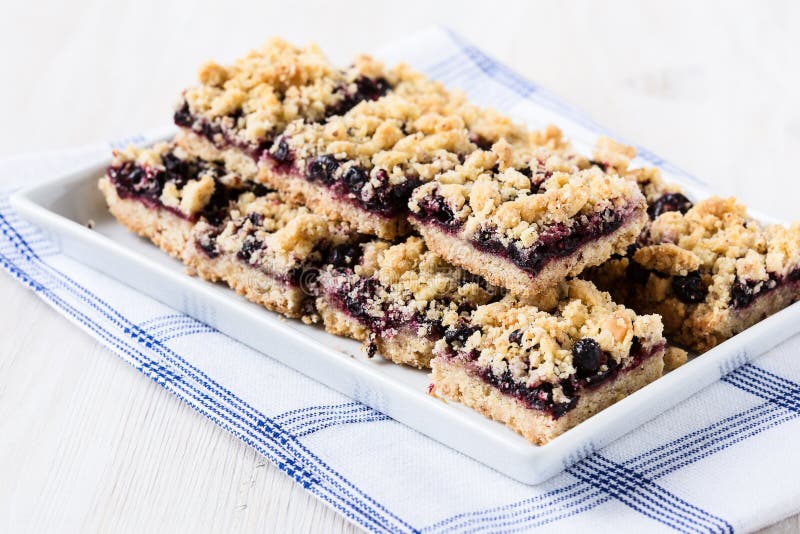 Homemade currant cornmeal crumble bars with streusel topping, healthy sweet dessert. Homemade currant cornmeal crumble bars with streusel topping, healthy sweet dessert