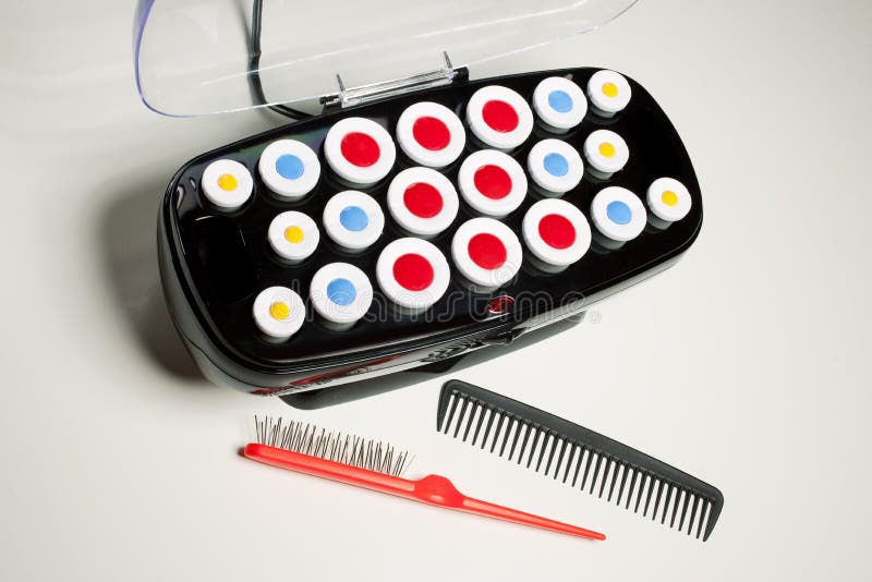 Electric hair curlers, brush and comb. Electric hair curlers, brush and comb