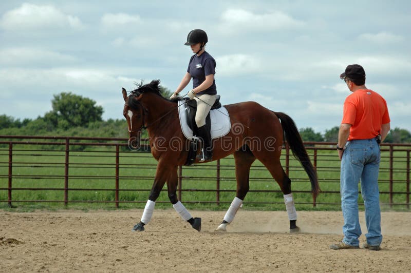 De Les van het Paardrijden royalty-vrije stock foto De Les van het Paardrijden royalty-vrije stock foto