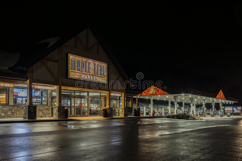 VERONA BEACH, NEW YORK - MAR. 10, 2019: - Night shot of Maple Leaf Market, a convenience store chain and gas station with all day food serving Grab & Go, grocery, lunch, brunch, breakfast, takeaway, fuel, pumps, dinner, shop, state, upstate, ny, central, cny, nys, usa, america, lights, buy, purchase, hungry, low, key, sign, brand, editorial, petrol, gasoline. VERONA BEACH, NEW YORK - MAR. 10, 2019: - Night shot of Maple Leaf Market, a convenience store chain and gas station with all day food serving Grab & Go, grocery, lunch, brunch, breakfast, takeaway, fuel, pumps, dinner, shop, state, upstate, ny, central, cny, nys, usa, america, lights, buy, purchase, hungry, low, key, sign, brand, editorial, petrol, gasoline