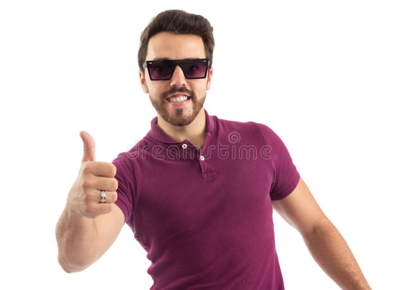 Thumb up. Man with sunglasses nods positively. Summer. Beautiful and bearded person. He is wearing a magenta polo shirt. White background, isolated. Thumb up. Man with sunglasses nods positively. Summer. Beautiful and bearded person. He is wearing a magenta polo shirt. White background, isolated.