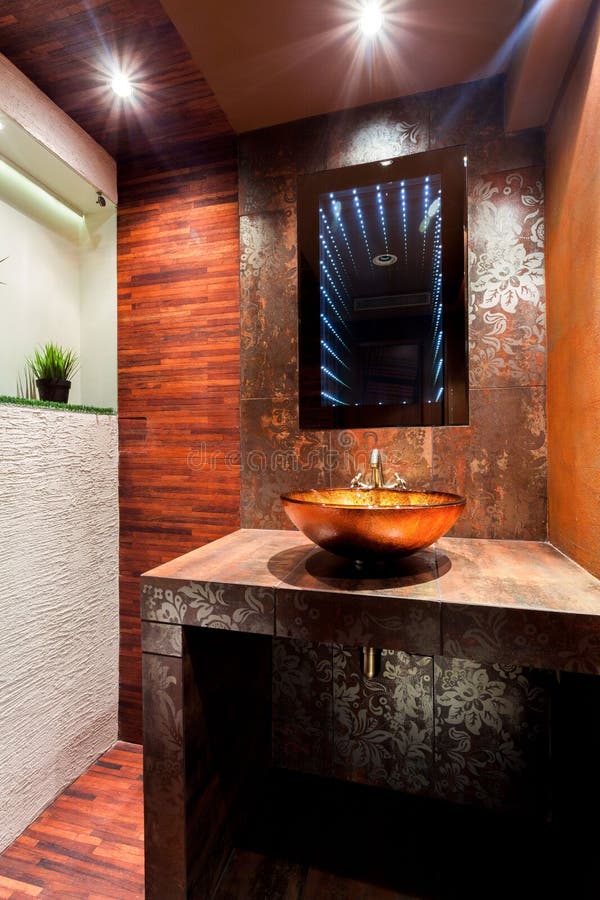 Interior of luxury modern brown and orange bathroom. Interior of luxury modern brown and orange bathroom