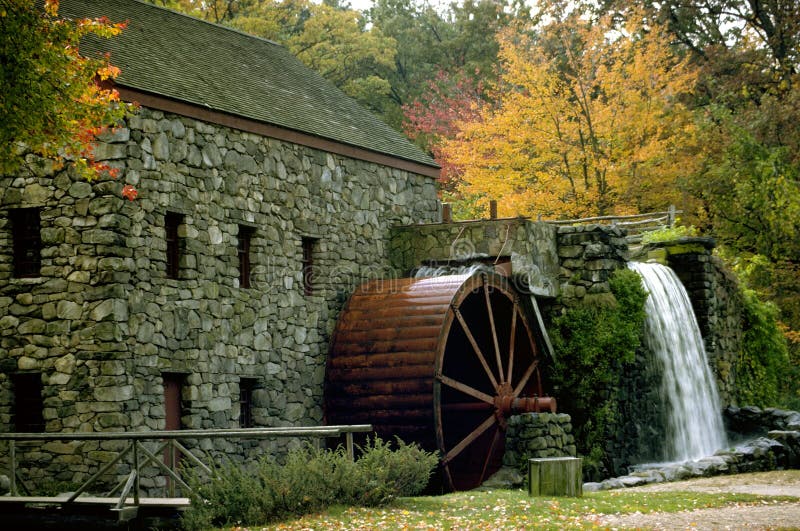 Old water wheel mill in a New England fall. Old water wheel mill in a New England fall