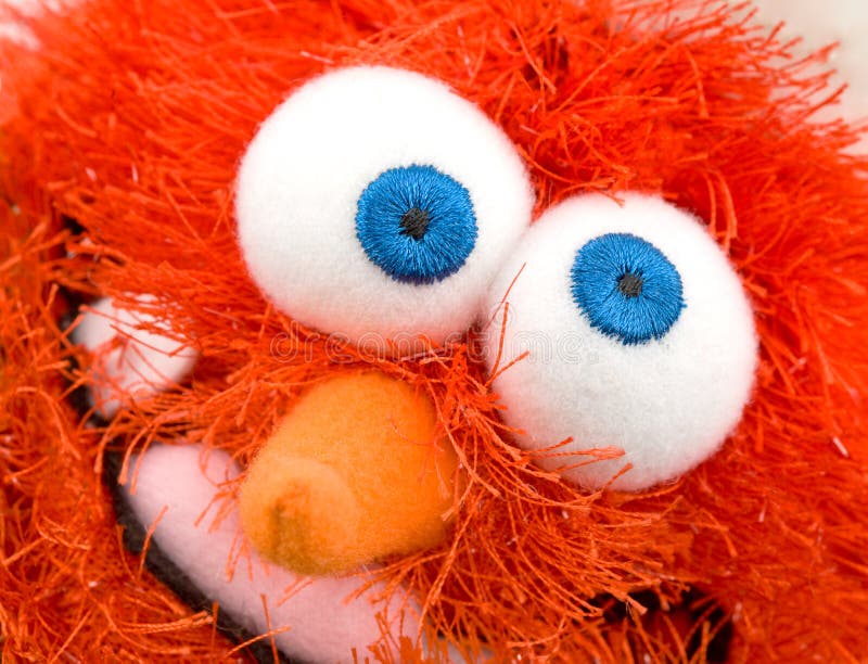 Silly, Weird Eyed Red Fuzzy Monster Grinning. Silly, Weird Eyed Red Fuzzy Monster Grinning