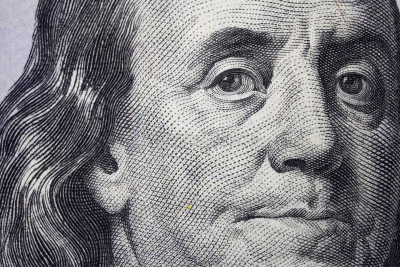 Macro closeup of Benjamin Franklin on the new 100 dollar bill USA. Macro closeup of Benjamin Franklin on the new 100 dollar bill USA