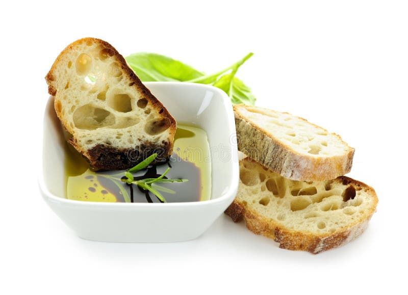 De olijfolie en de azijn van het brood