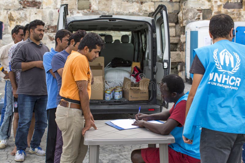 De oorlogsvluchtelingen zijn geregistreerde werknemers van UNHCR - het de V.N.-Vluchtelingsagentschap stock fotografie De oorlogsvluchtelingen zijn geregistreerde werknemers van UNHCR - het de V.N.-Vluchtelingsagentschap stock fotografie
