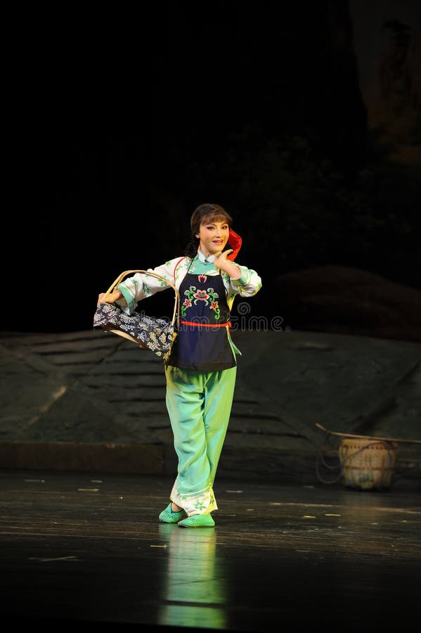 De opera van het meisjesjiangxi van het land een weeghaak royalty-vrije stock foto's De opera van het meisjesjiangxi van het land een weeghaak royalty-vrije stock foto's