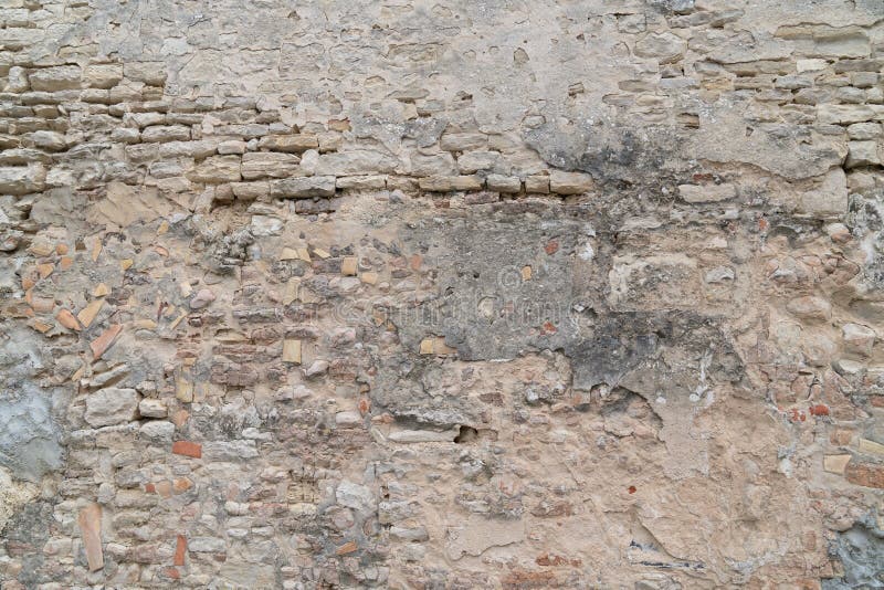 De oude steen Beschadigde achtergrond van de Muurtextuur royalty-vrije stock afbeeldingen De oude steen Beschadigde achtergrond van de Muurtextuur royalty-vrije stock afbeeldingen