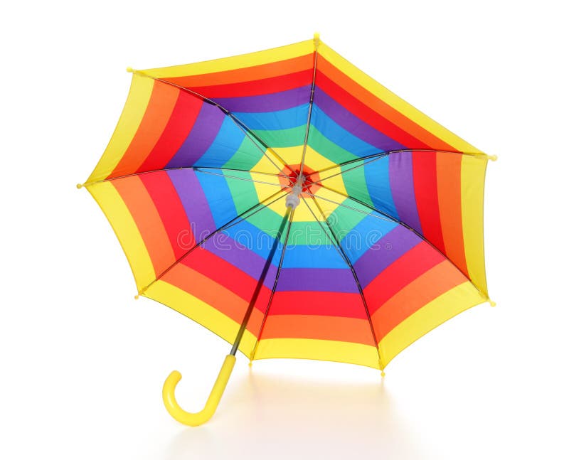 A colorful rainbow colored umbrella over white background. A colorful rainbow colored umbrella over white background