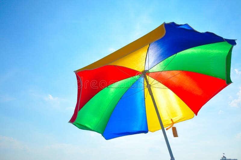 De paraplu van het strand stock fotografie De paraplu van het strand stock fotografie