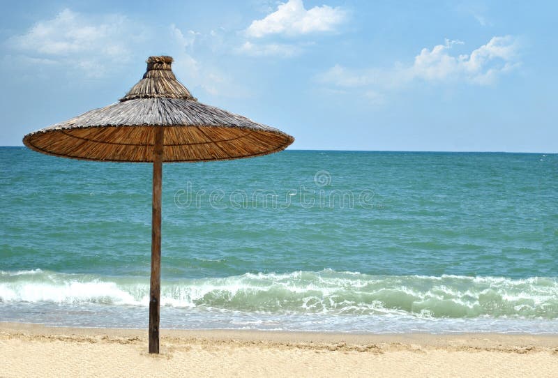 De paraplu van het strand stock fotografie De paraplu van het strand stock fotografie