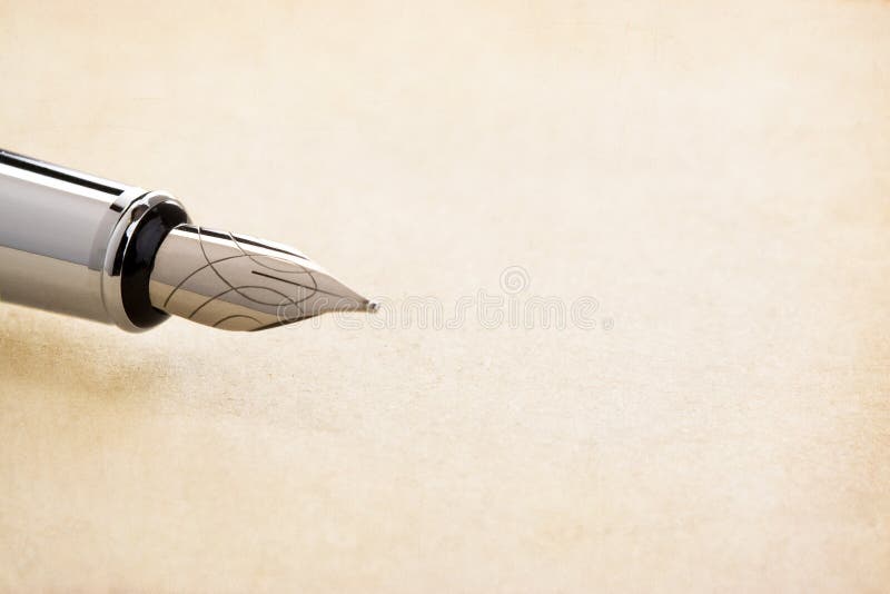 De pen en het perkament van de inkt stock foto's De pen en het perkament van de inkt stock foto's
