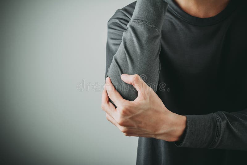 De pijn van de mensenelleboog royalty-vrije stock afbeelding De pijn van de mensenelleboog royalty-vrije stock afbeelding