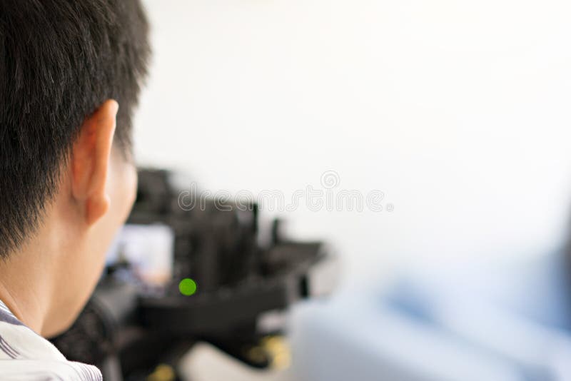 De professionele fotografen schieten videoklemmen en foto stock fotografie De professionele fotografen schieten videoklemmen en foto stock fotografie