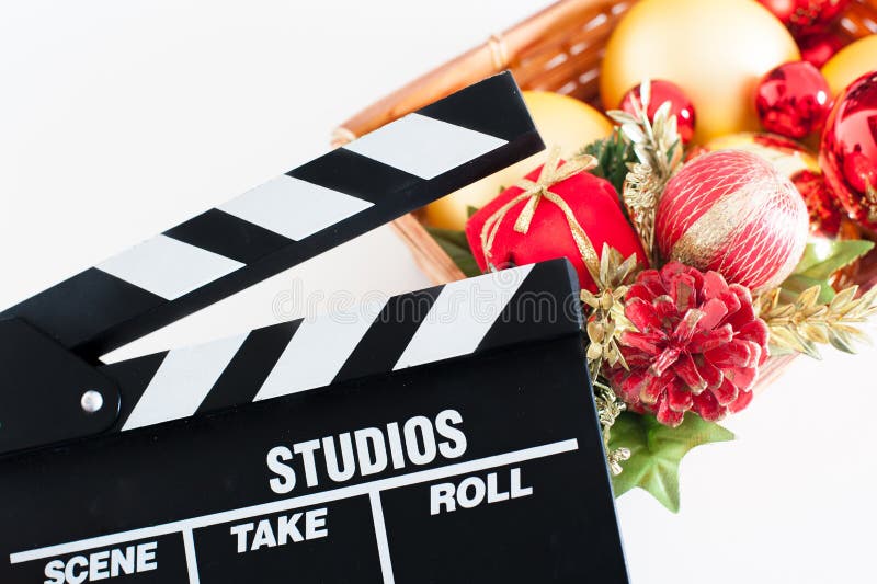 De raad van de filmklep en Kerstmisdecoratie stock foto De raad van de filmklep en Kerstmisdecoratie stock foto