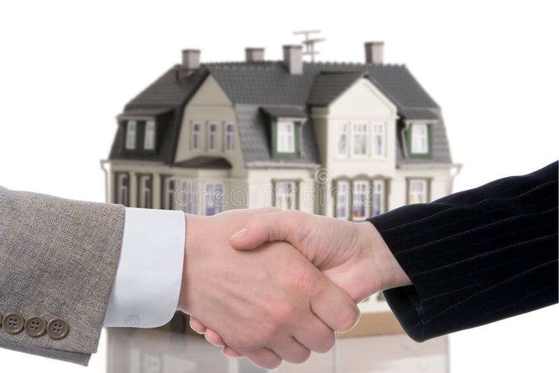 De regeling van de handdruk het kopen - het verkopen van huis royalty-vrije stock afbeelding De regeling van de handdruk het kopen - het verkopen van huis royalty-vrije stock afbeelding